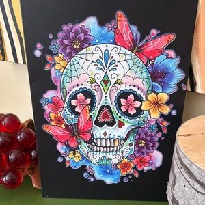 Displayed Colorful Sugar Skull Art on metal signed